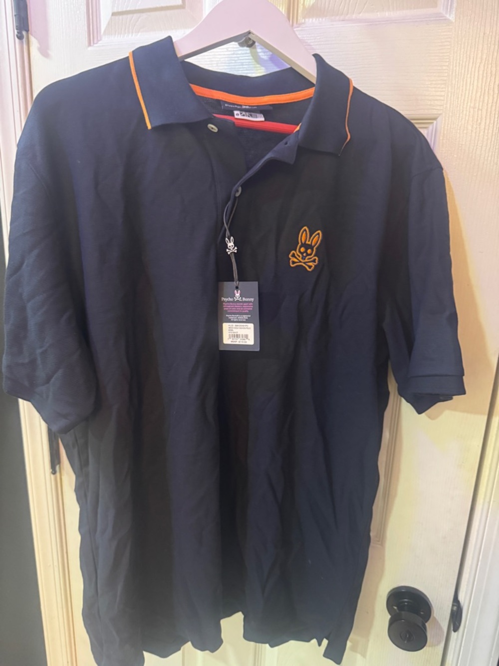Psycho Bunny Navy Polo with Orange Logo and Trim